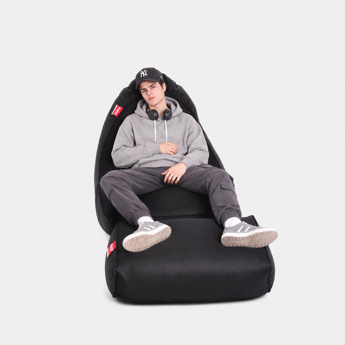 Front view of the Blackout VIP black gaming beanbag and matching footrest